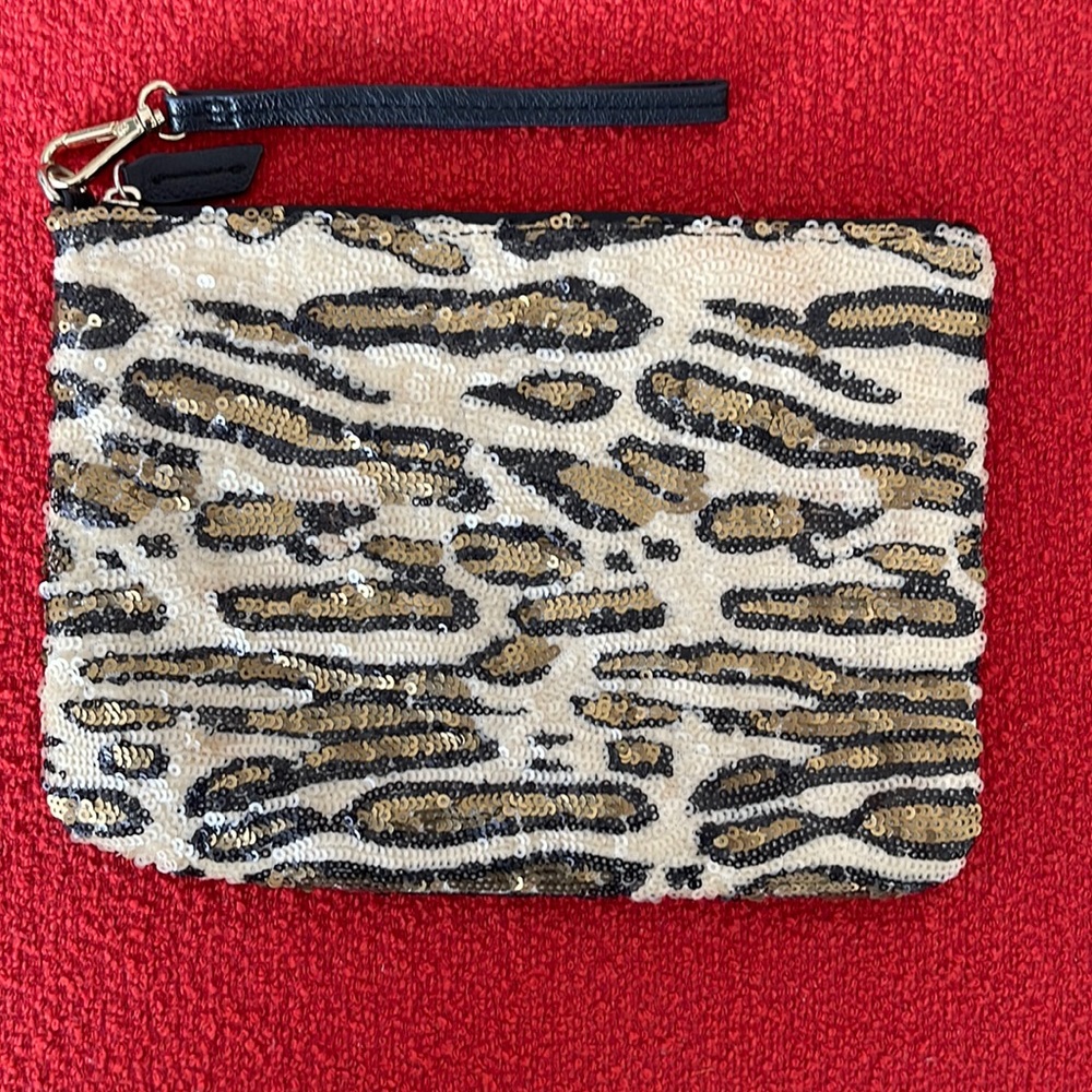 Sequined clutch from The Limited. Bblack back, removable wrist strap.